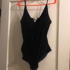 V-Lined black suede bodysuit